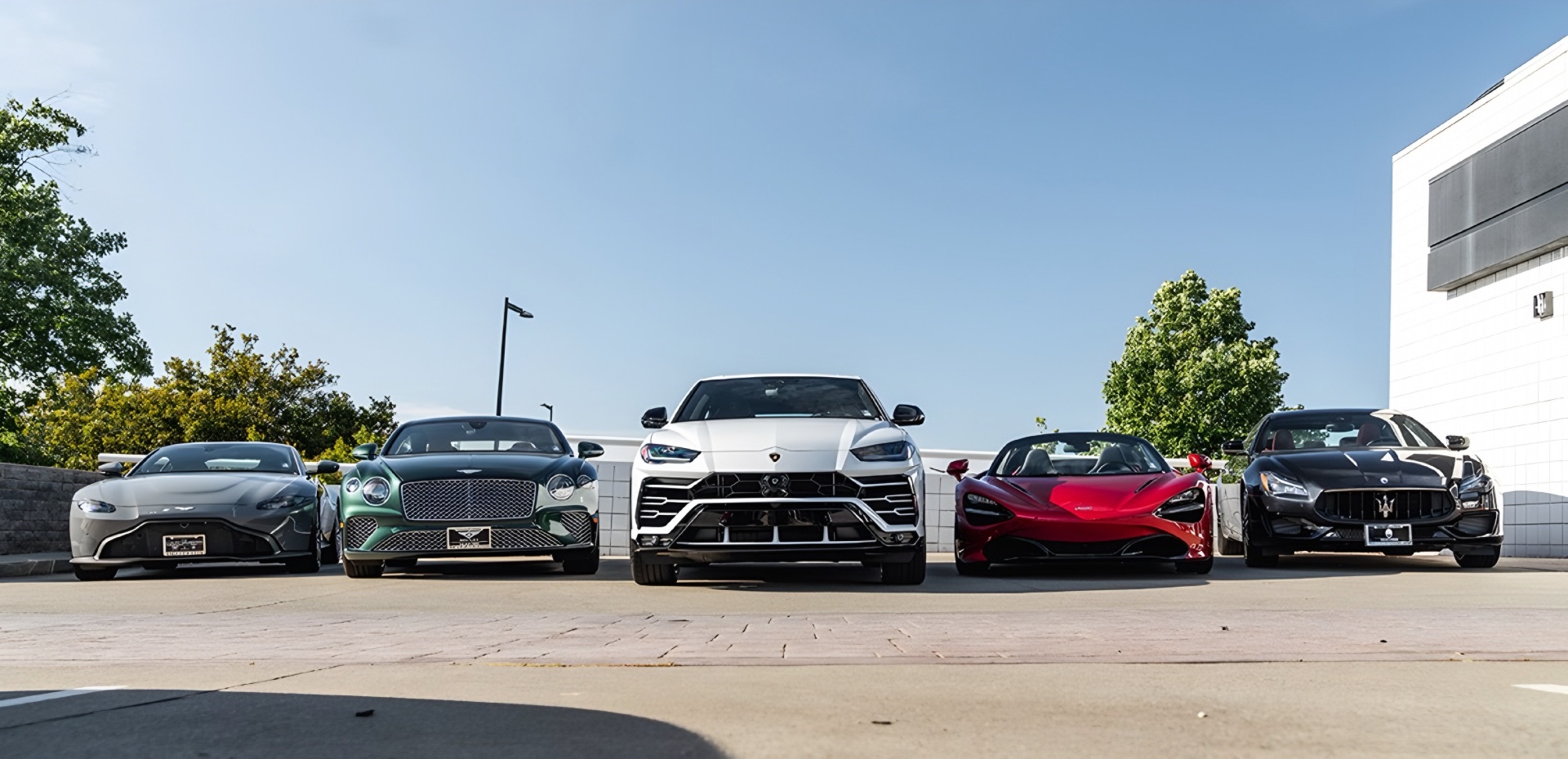 Premium luxury and exotic car rental fleet including Ferrari, Lamborghini, and McLaren supercars